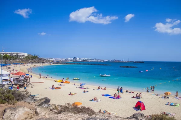 things to do in playa blanca for families at flamingo including pedaloes and windsurfing 